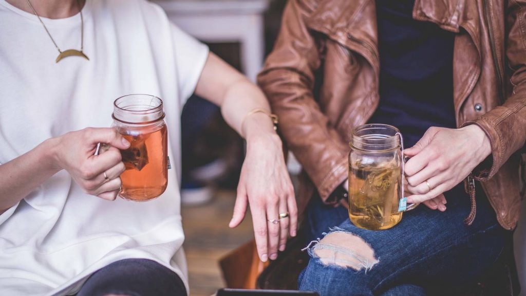 couple drinking at food festivals in cornwall