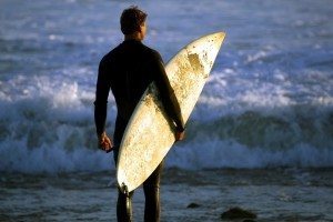 Checking out the surf on one of Cornwall's beautiful beaches. www.carbisbayholidays.co.uk