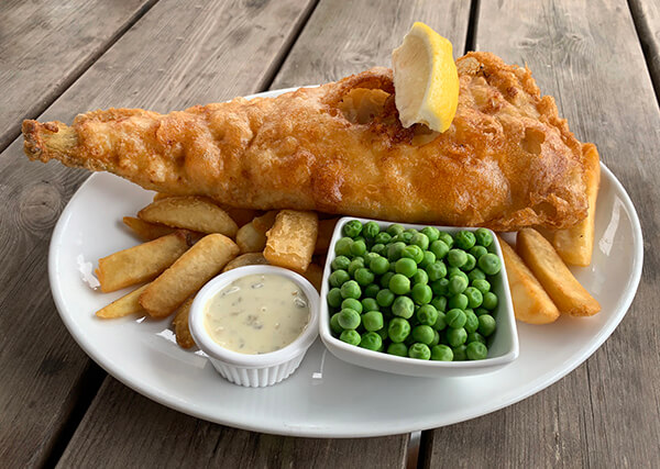 Fish and chips with peas and tartare sauce - best fish and chips in cornwall