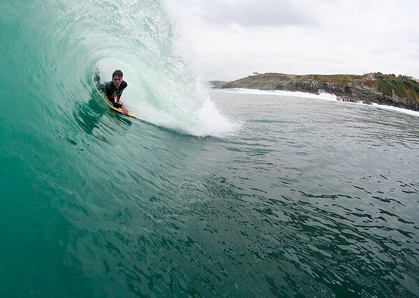 surfing in Porthleven, Cornwall